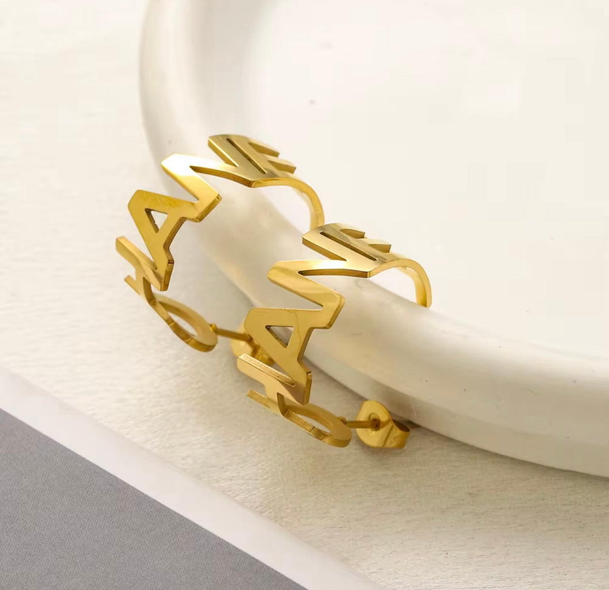 C C GOLD EARRINGS